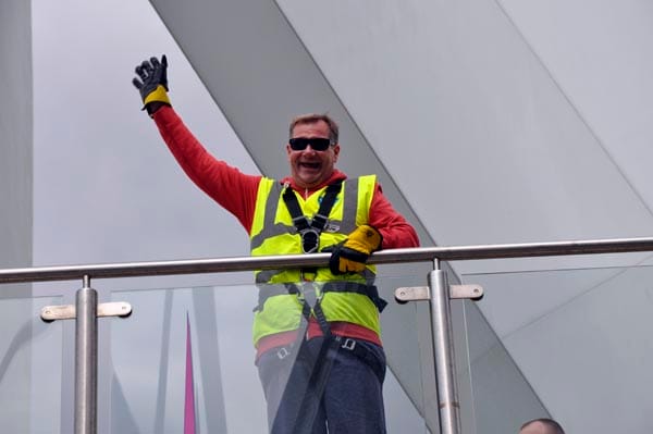 A relieved Miss Jason waves to her fans