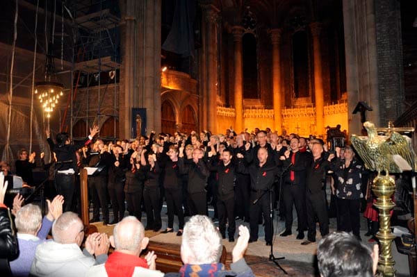 The combined choirs sing 