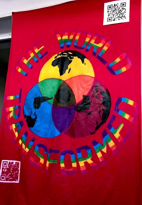 The World Transformed banner at Brighton Pride 2017