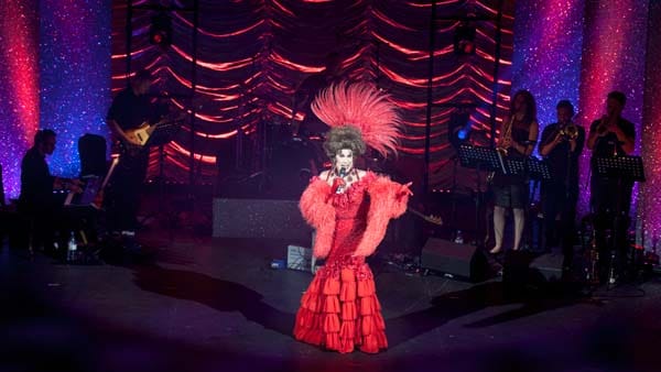 Ceri Dupree as Danny La Rue in Hello Dolly