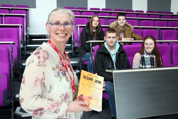 Author Cath Lloyd with students Jasmine Wood, 17, Reece Bowskill, 16, (back row) Brandon Lewis, 18, and Chloe Simpson, 17 (front row).