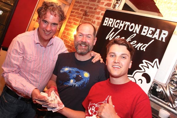 Bearly Legal receive the lolly from Alasdair (left), owner of the Camelford
