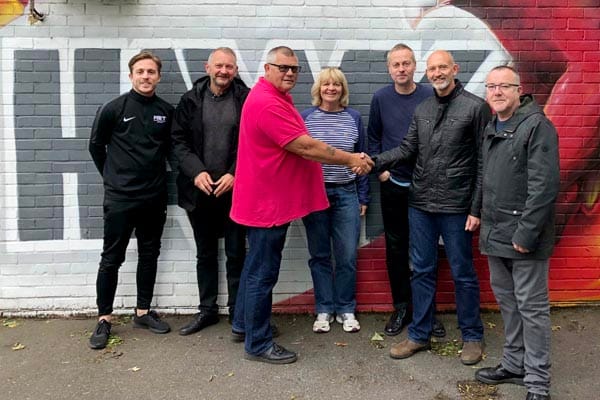 From L-R: From Whitehawk FC, Jude Macdonald - First Team Manager; Andy Schofield - Vice-Chairman; Nigel Thornton - General Manager, Jo Davis - Senior Administrator; Gary Pleece - Pleece & Co; Darren Snow - Strategic Manager and co-Founder of the Crew Club and  Kevin Miller - Head of Commercial, Whitehawk FC.