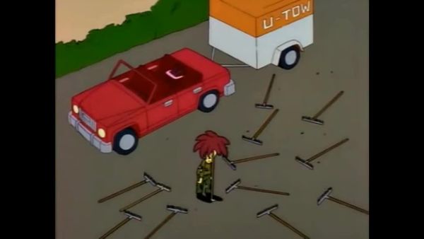 A picture of Simpsons character Sideshow Bob, stepping on a rake.