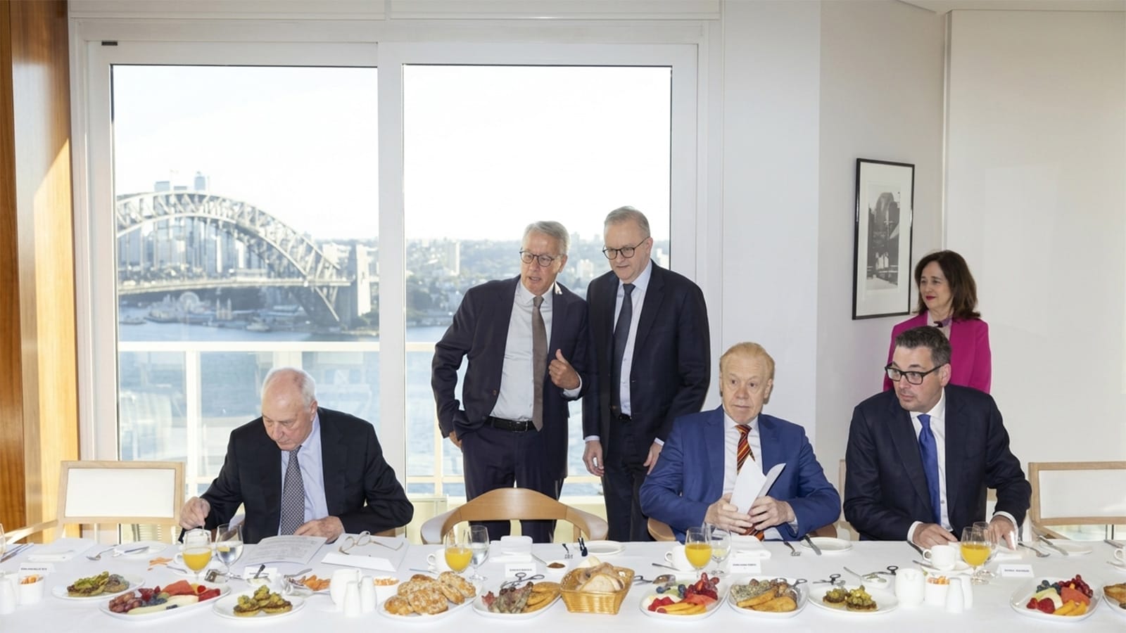 Labor leaders seated with Anthony Pratt at a harbourside luncheon table