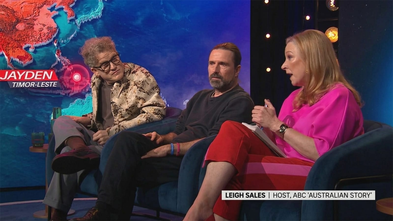 The Race Around the World studio panel during the program.