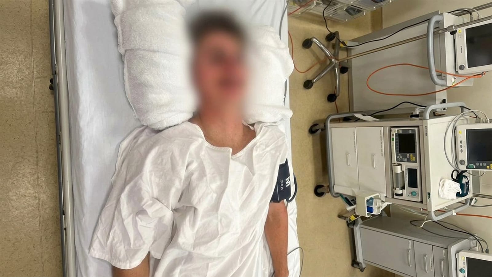 Lucas Jeisman lying in a hospital bed after the attack