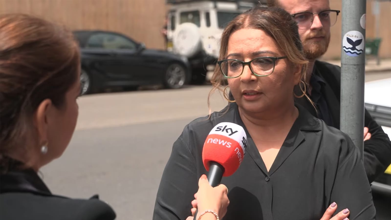 Mehreen Faruqi speaking into a Sky News microphone at Bondi