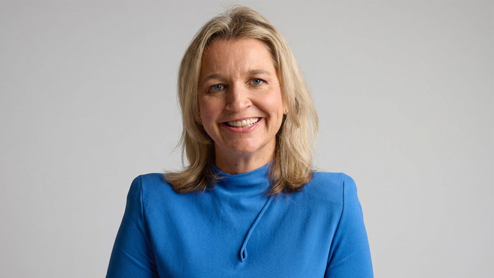 Dr Angela Jackson, Productivity Commission Commissioner, in a blue top