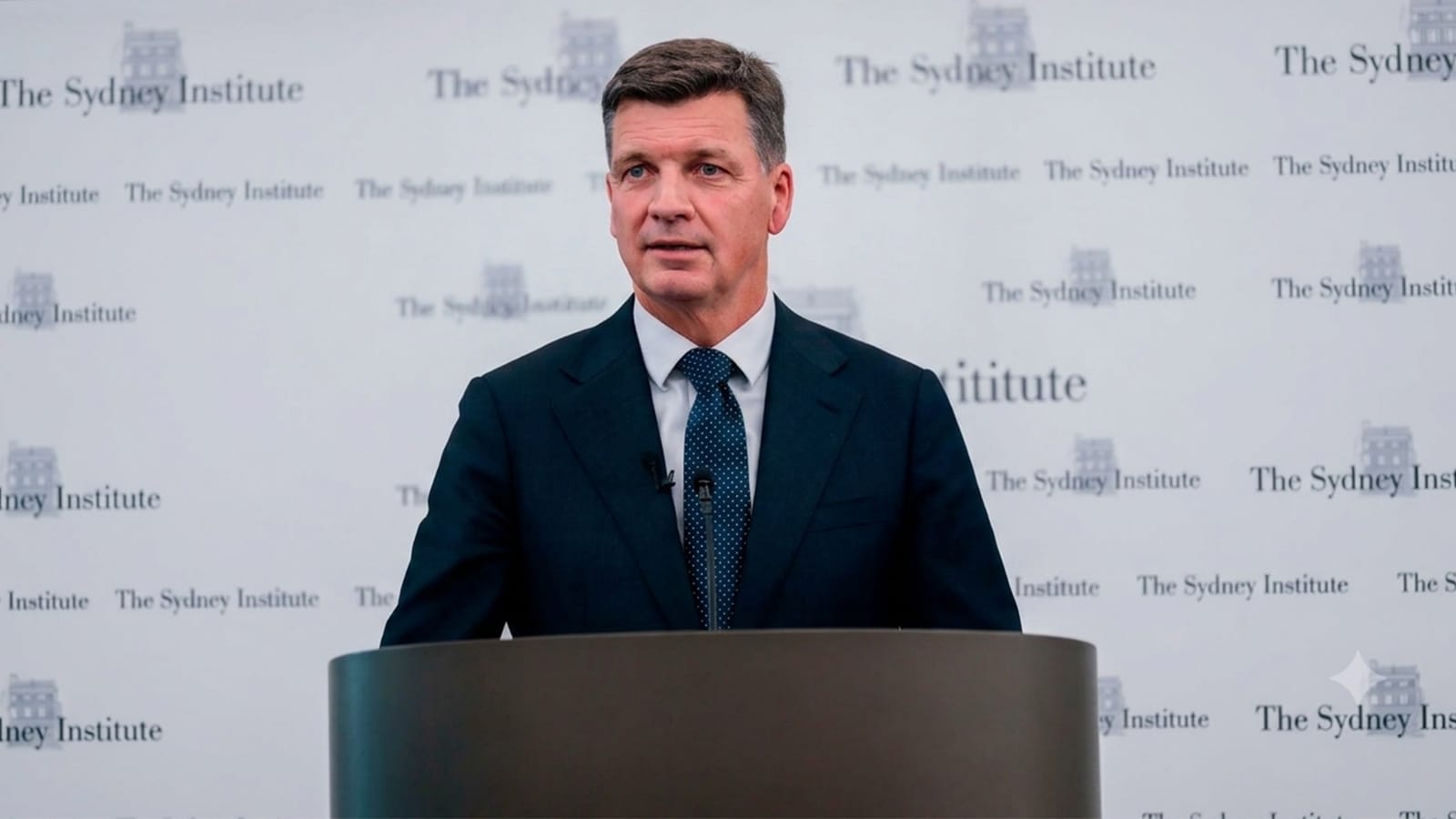 Angus Taylor speaking at a lectern in front of a Sydney Institute backdrop