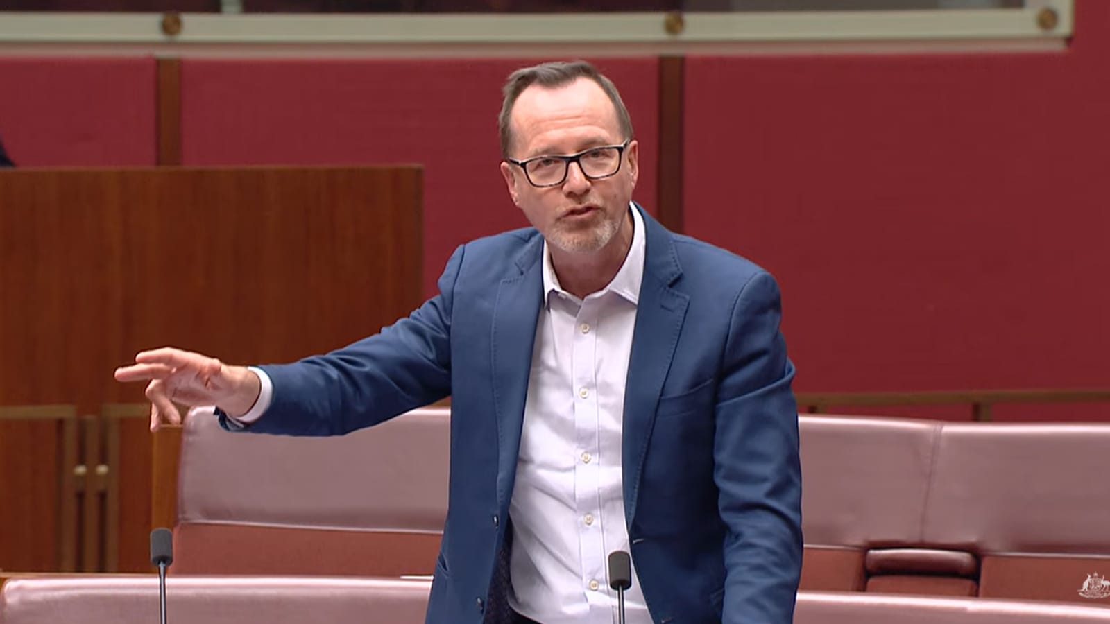 David Shoebridge gesturing while speaking in the Senate chamber