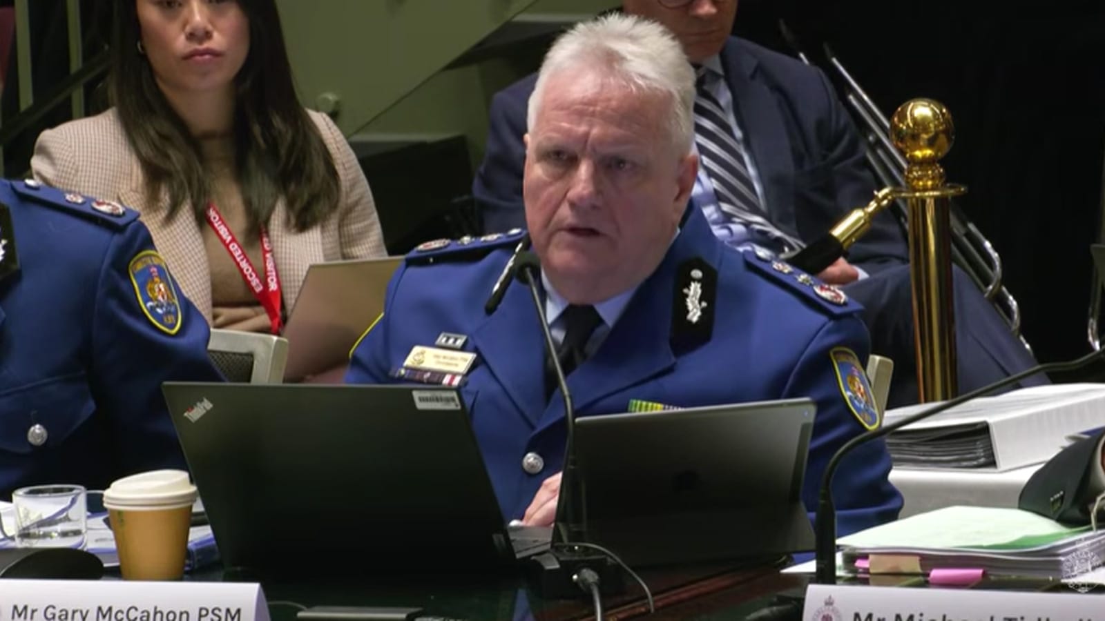 Corrective Services Commissioner Gary McCahon giving evidence at a parliamentary committee table