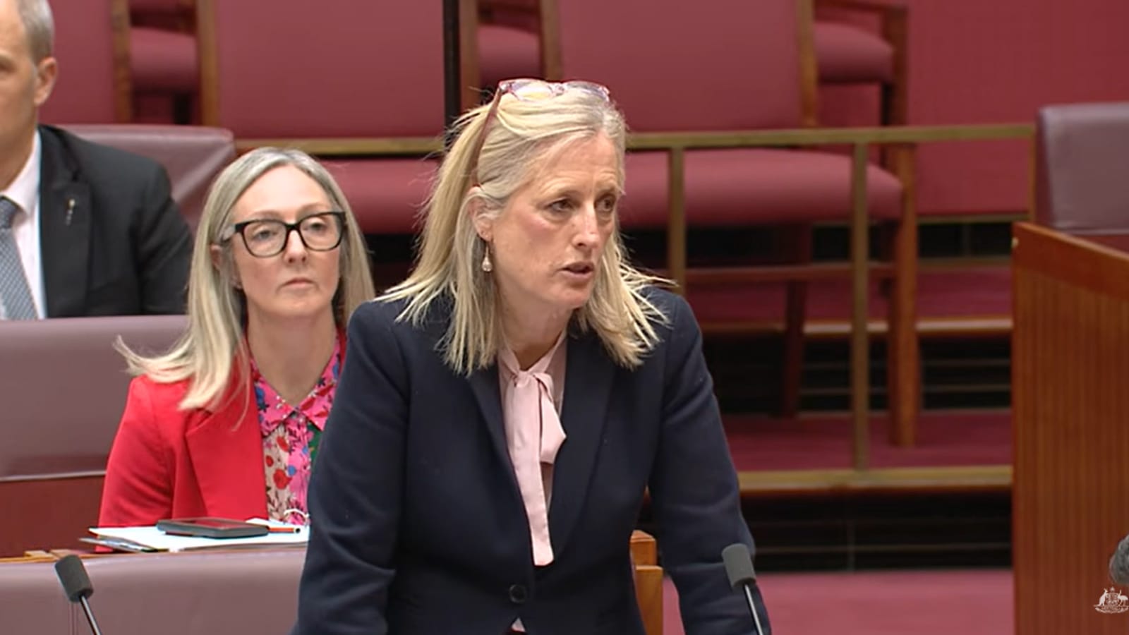 Katy Gallagher standing to speak in the Senate chamber
