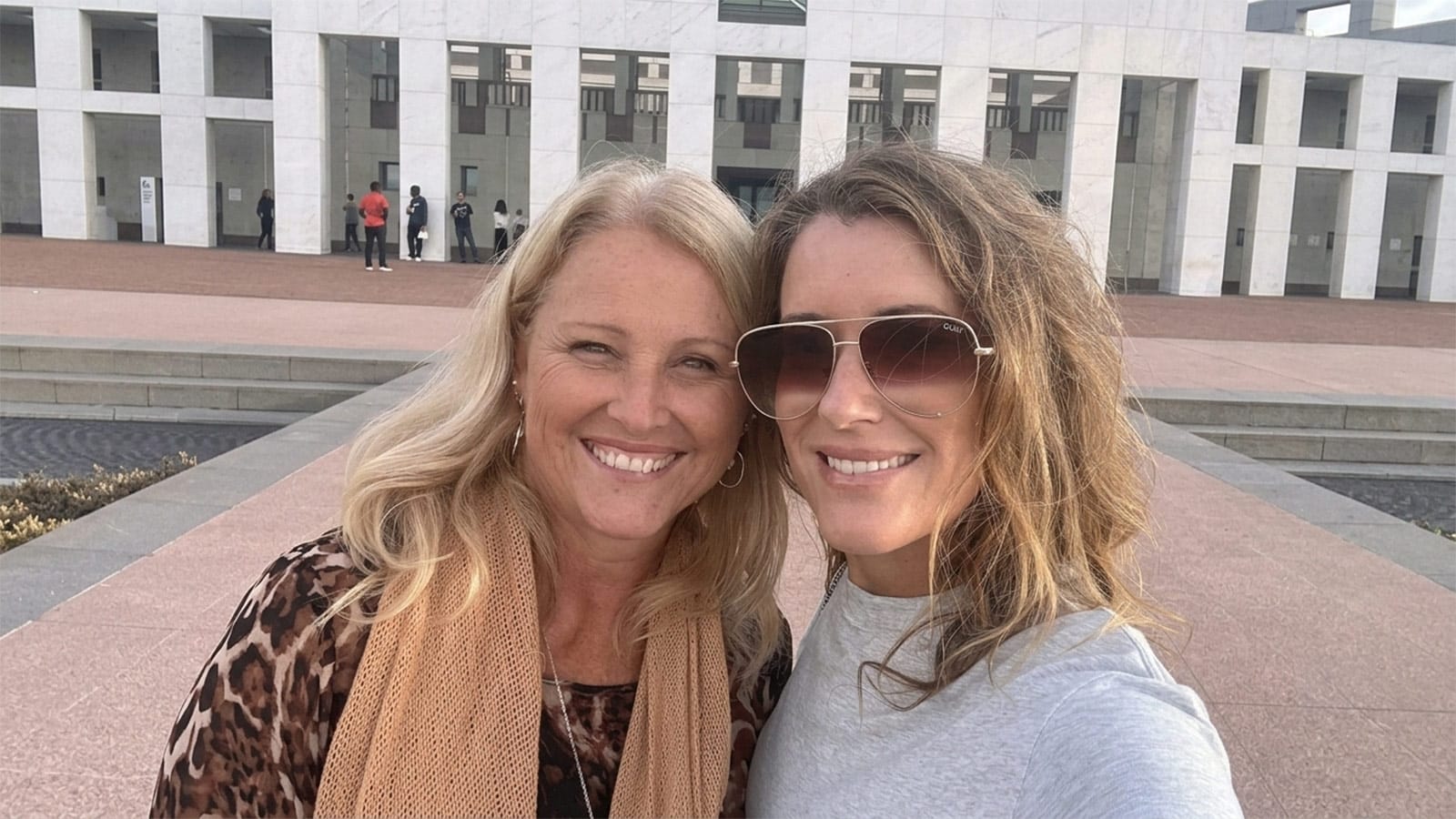 Kirralie Smith and Sall Grover outside Parliament House in Canberra