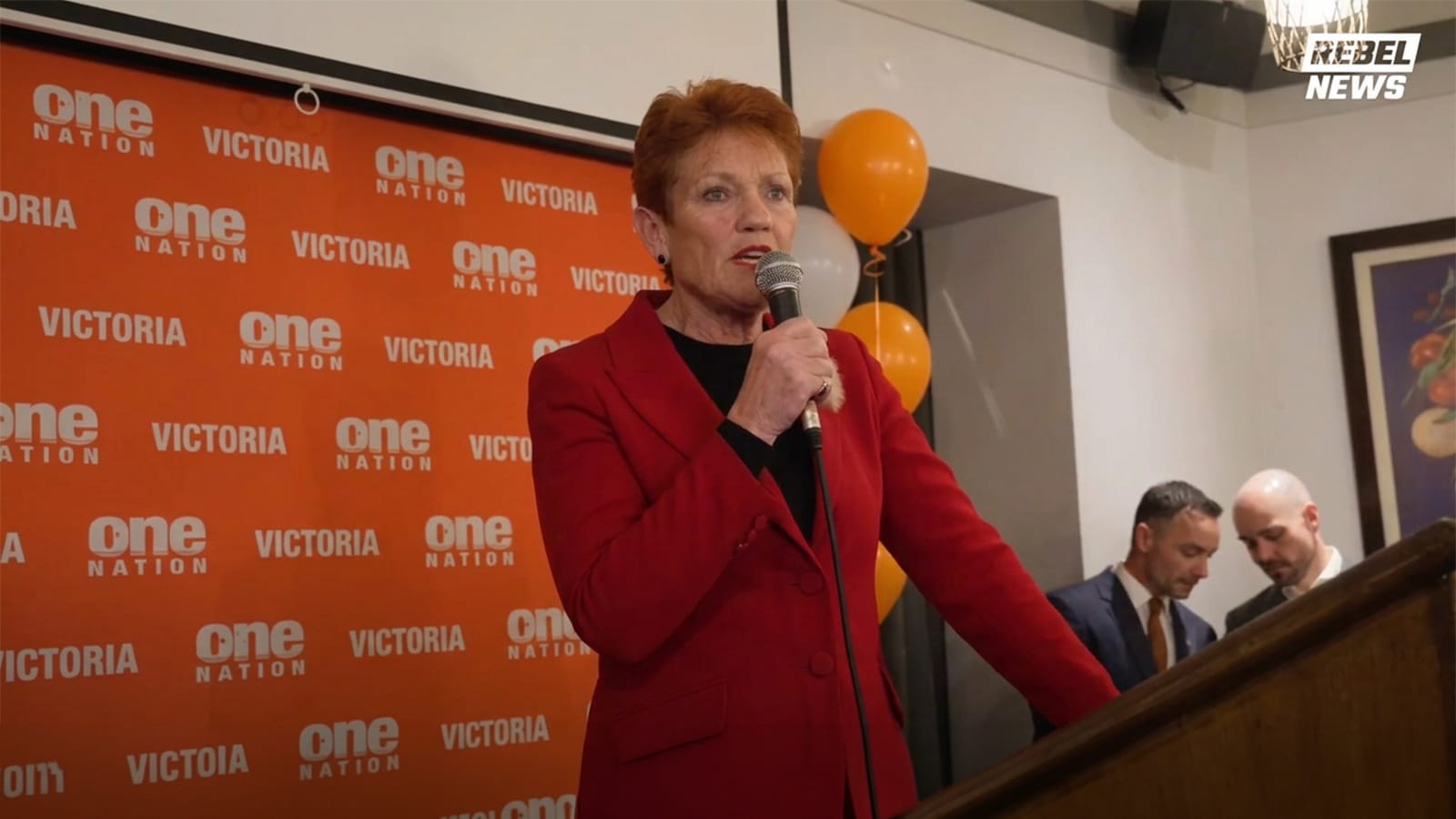 Pauline Hanson speaking into a microphone at the One Nation Victoria fundraiser