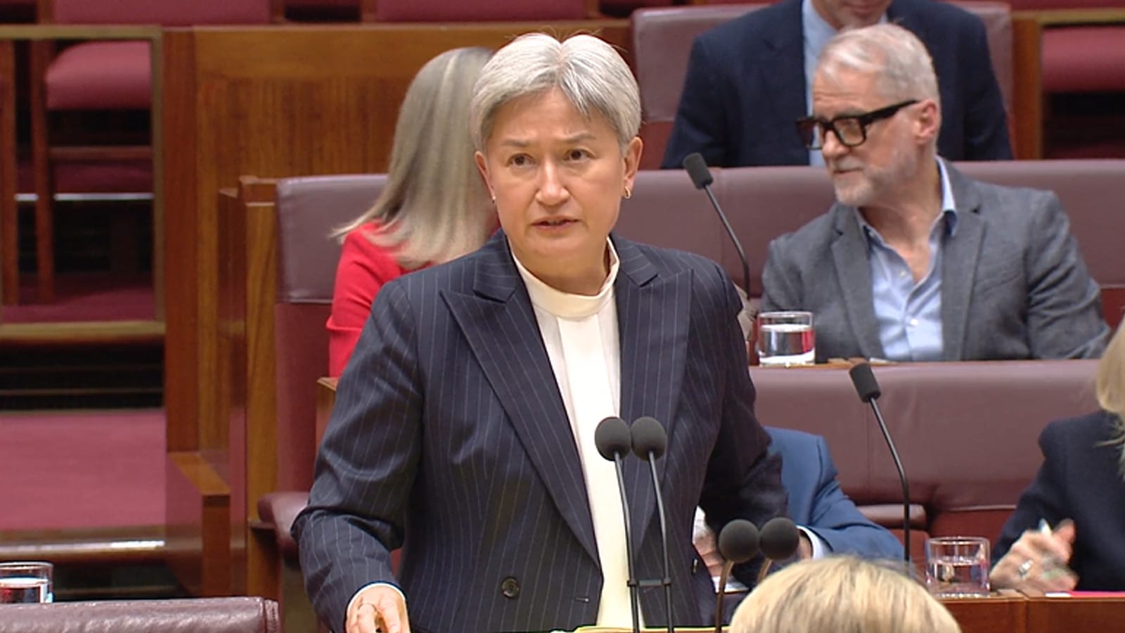 Penny Wong at the despatch box answering questions in the Senate