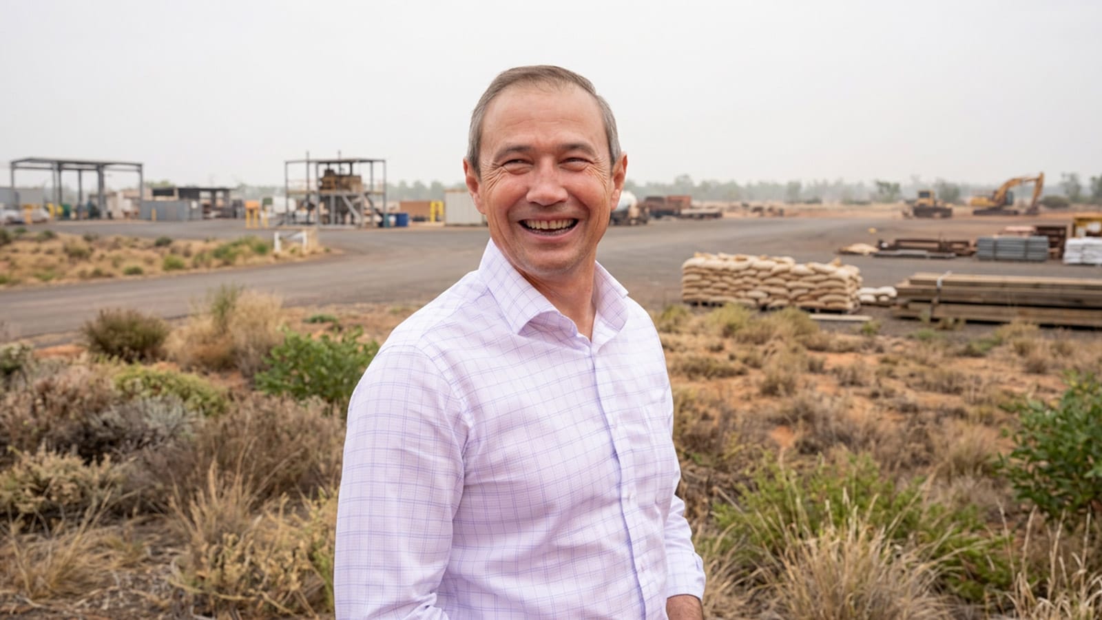 Roger Cook smiling at an outdoor resources site in Western Australia