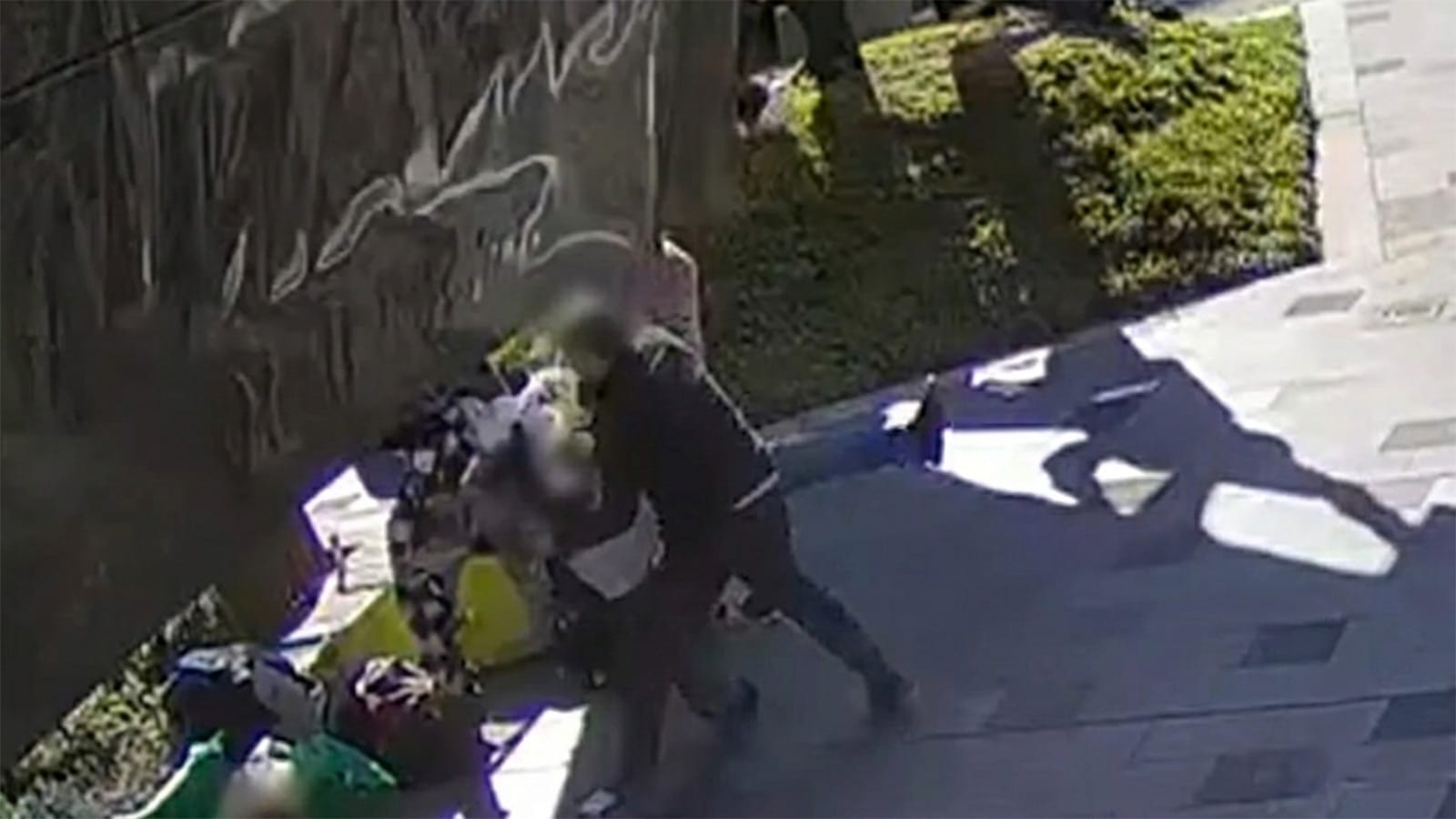 Blurred CCTV still of the alleged street attack in Sunshine