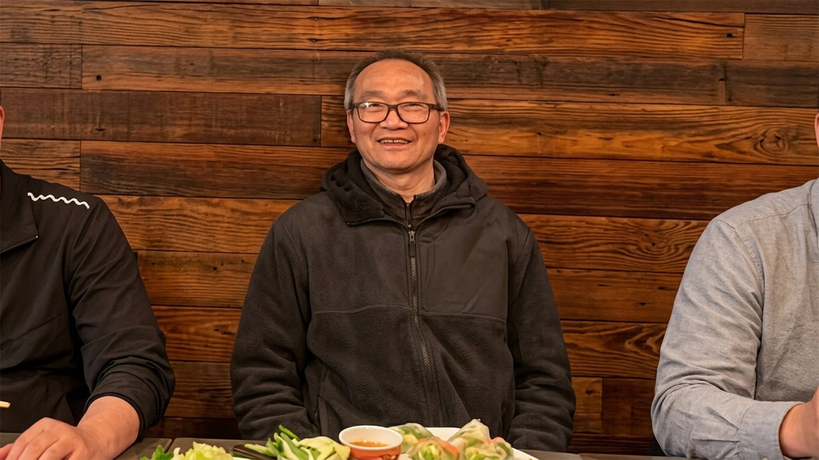 Van Viet Truong smiling in a dark fleece jacket