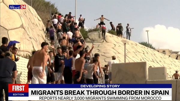 Migrants break through Spain's border in their thousands, weeks after a million were legalised