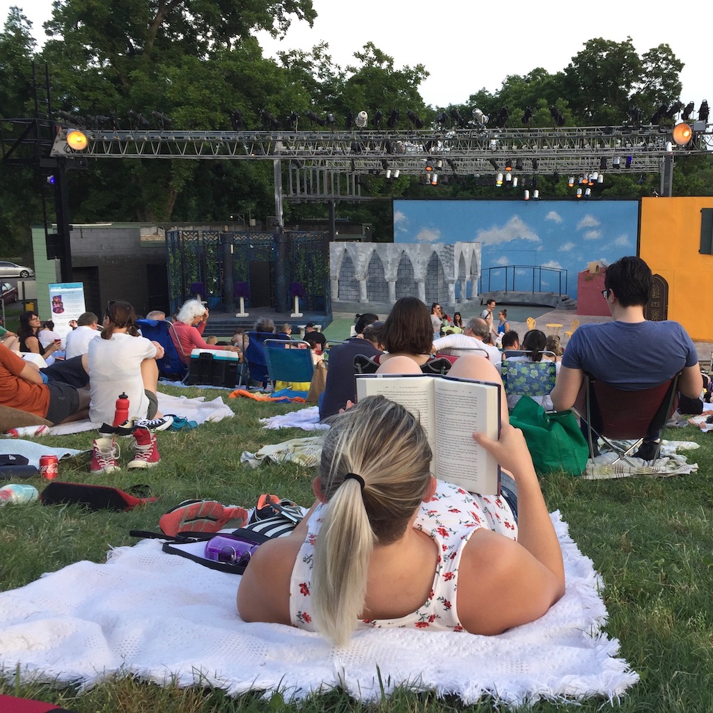 Crowd waits for the play to start.