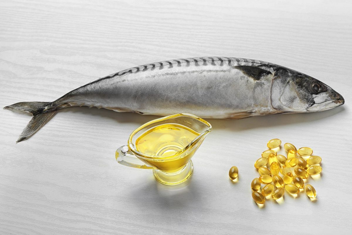 Fish, fish oil pills, pitcher of o