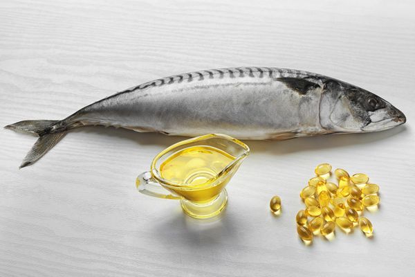 Fish, fish oil pills, pitcher of o