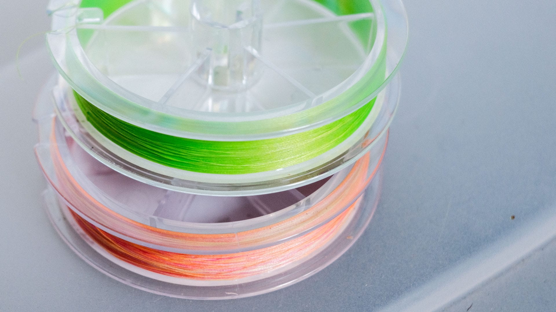 Orange and green braid fishing line