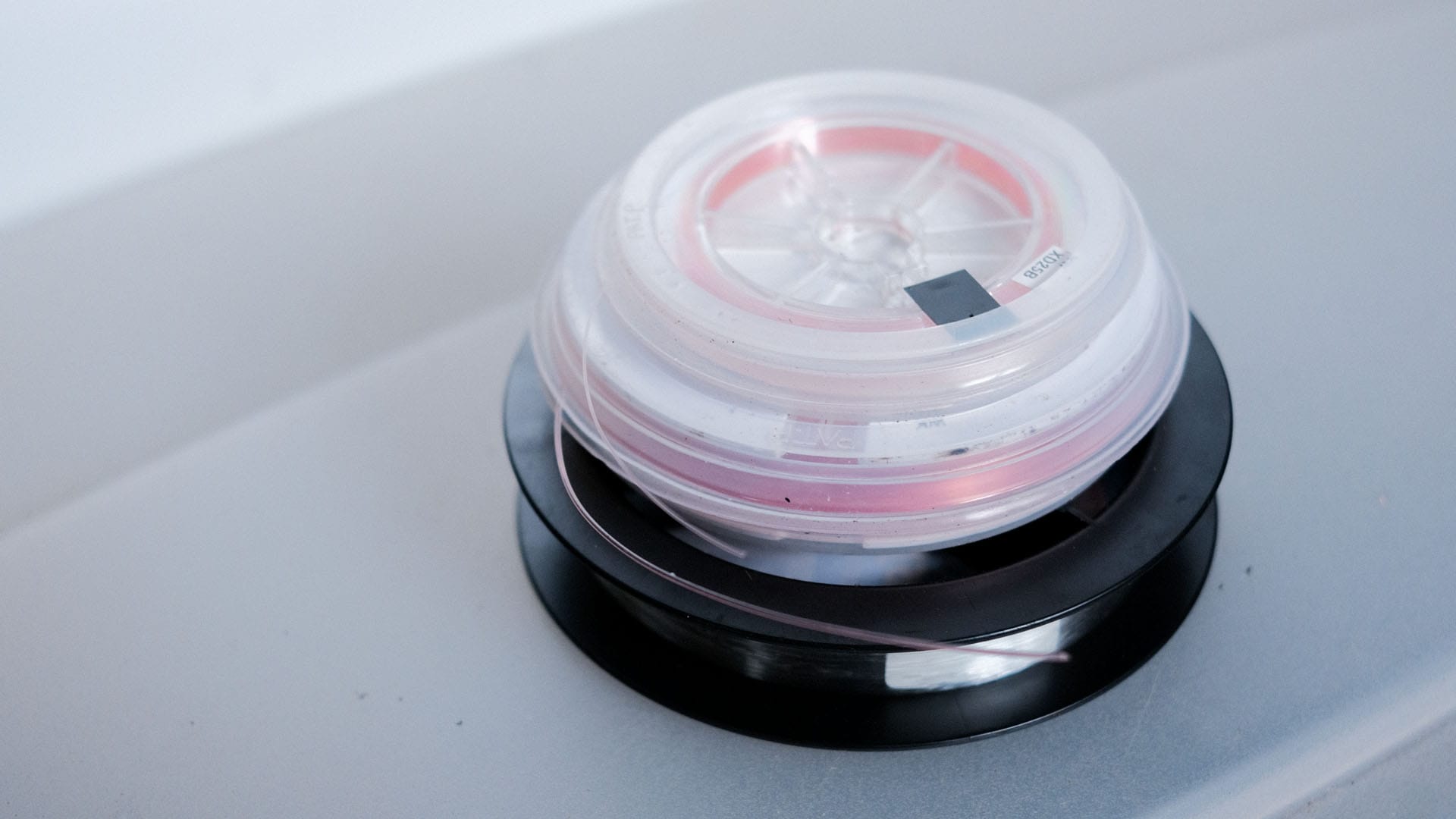 Fluoro fihisng line spools stacked on top of each other