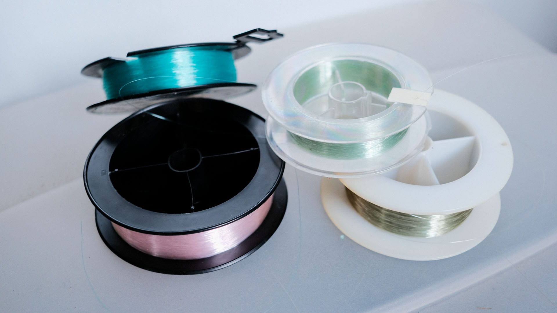 Mono fishing line spools of different colours