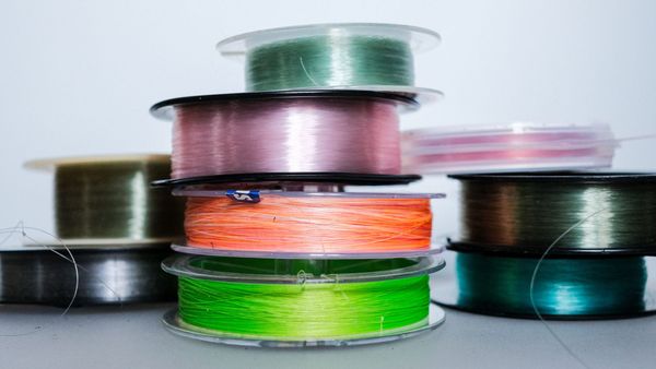 A stack of braid, mono and fluoro fishing lines