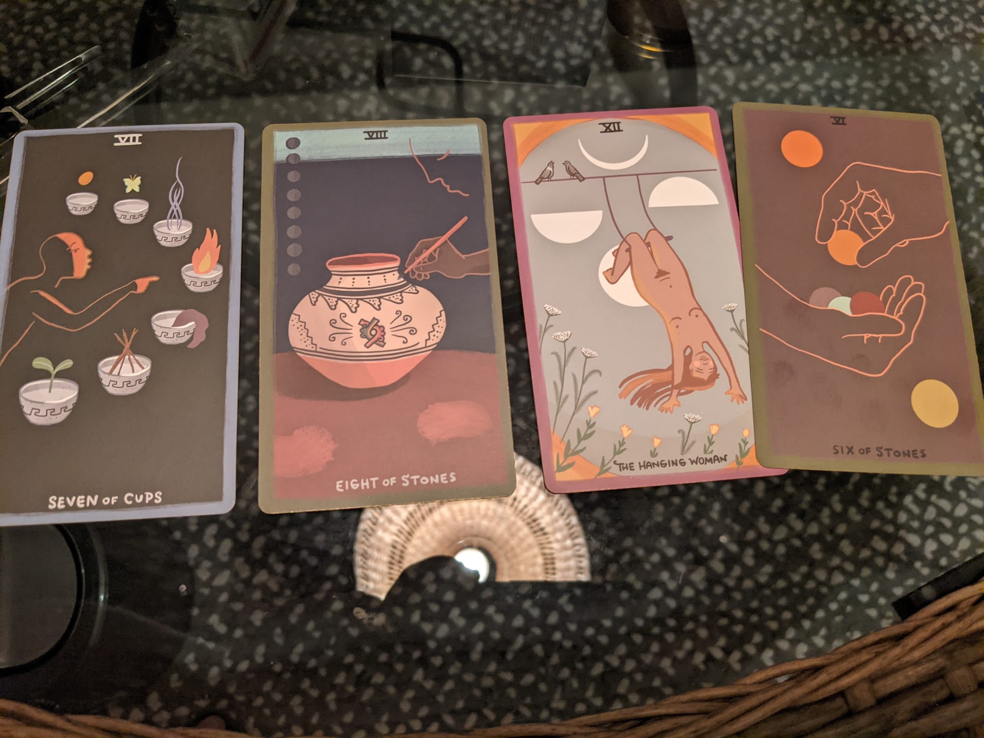 Past/Present/Future spread with The Gentle Tarot, four cards spread out on glass table, images described in content below