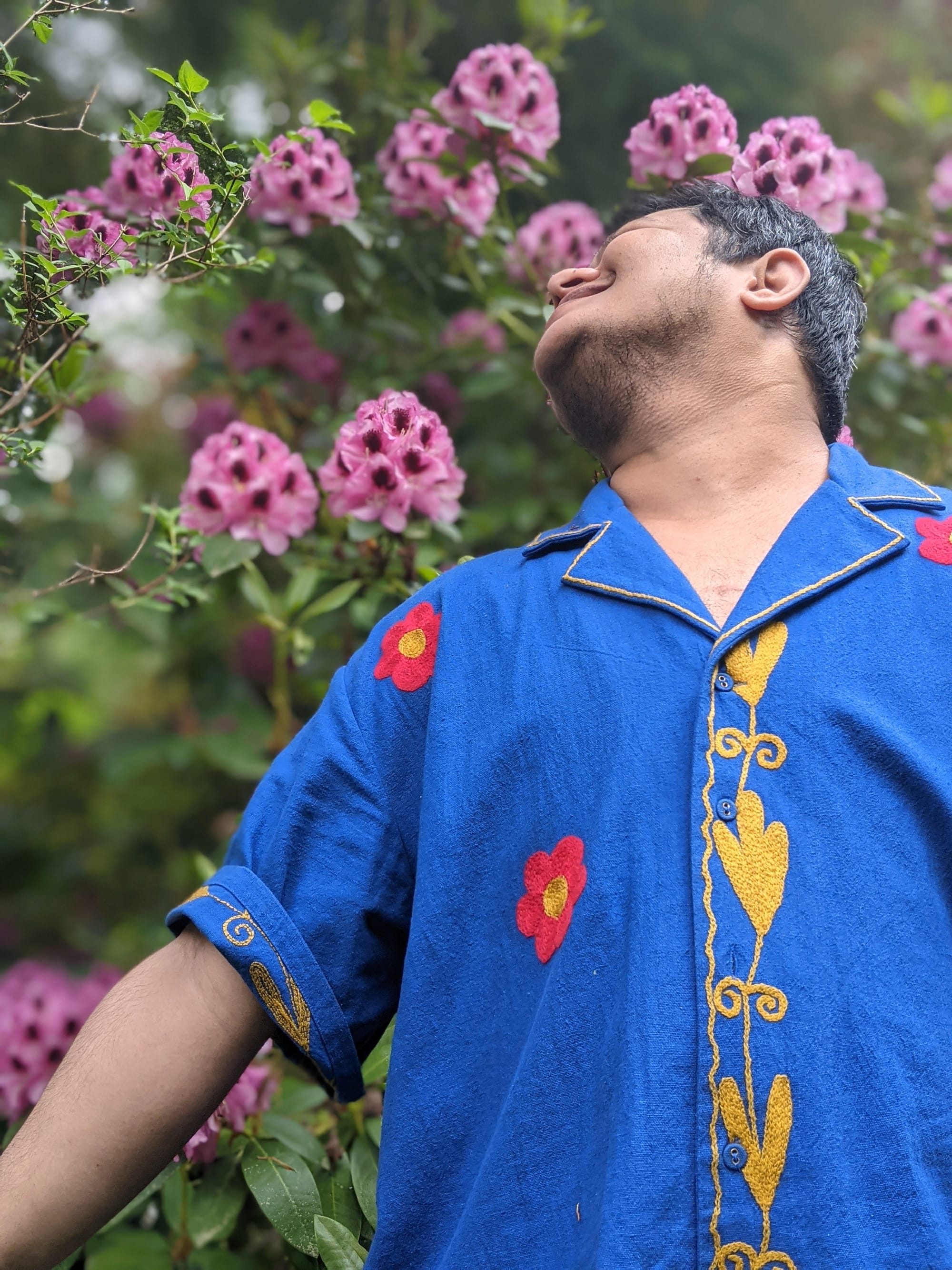 With the rhododendrons, Refusal. Self potraiture by Kadir