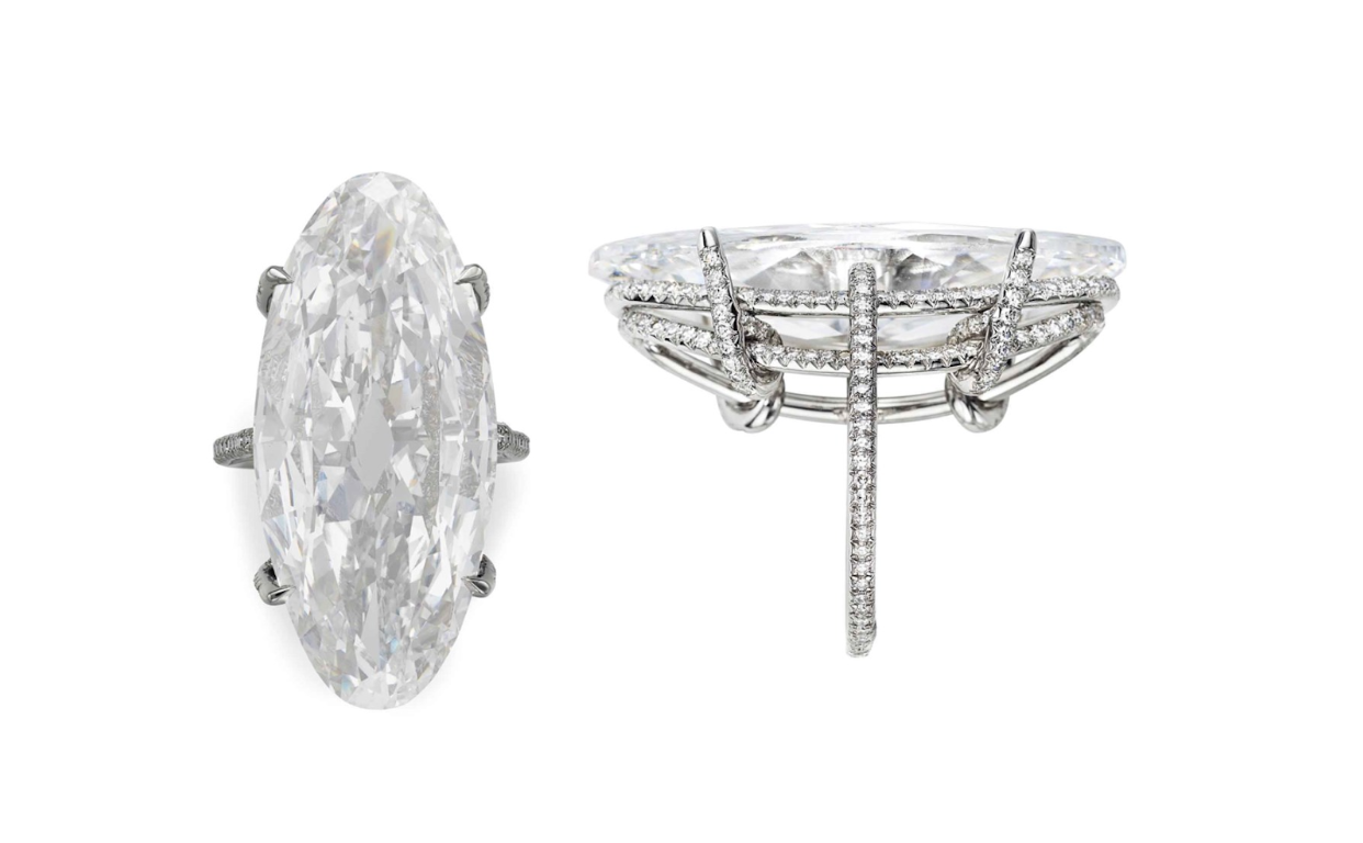 'Thread' ring by JAR, featuring a 22.76-carat elongated oval brilliant-cut diamond set within a two-tiered threadwork gallery and hoop. 
