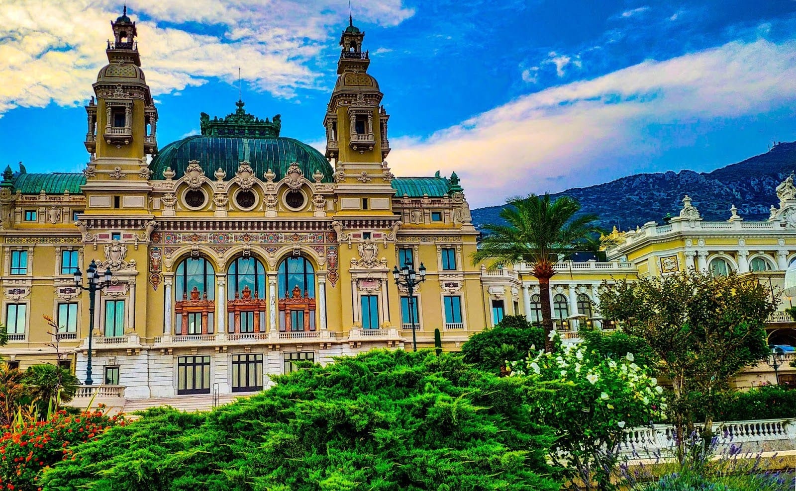 Admire the view of the opera’s opulent facade adorned with intricate Beaux-Arts details.