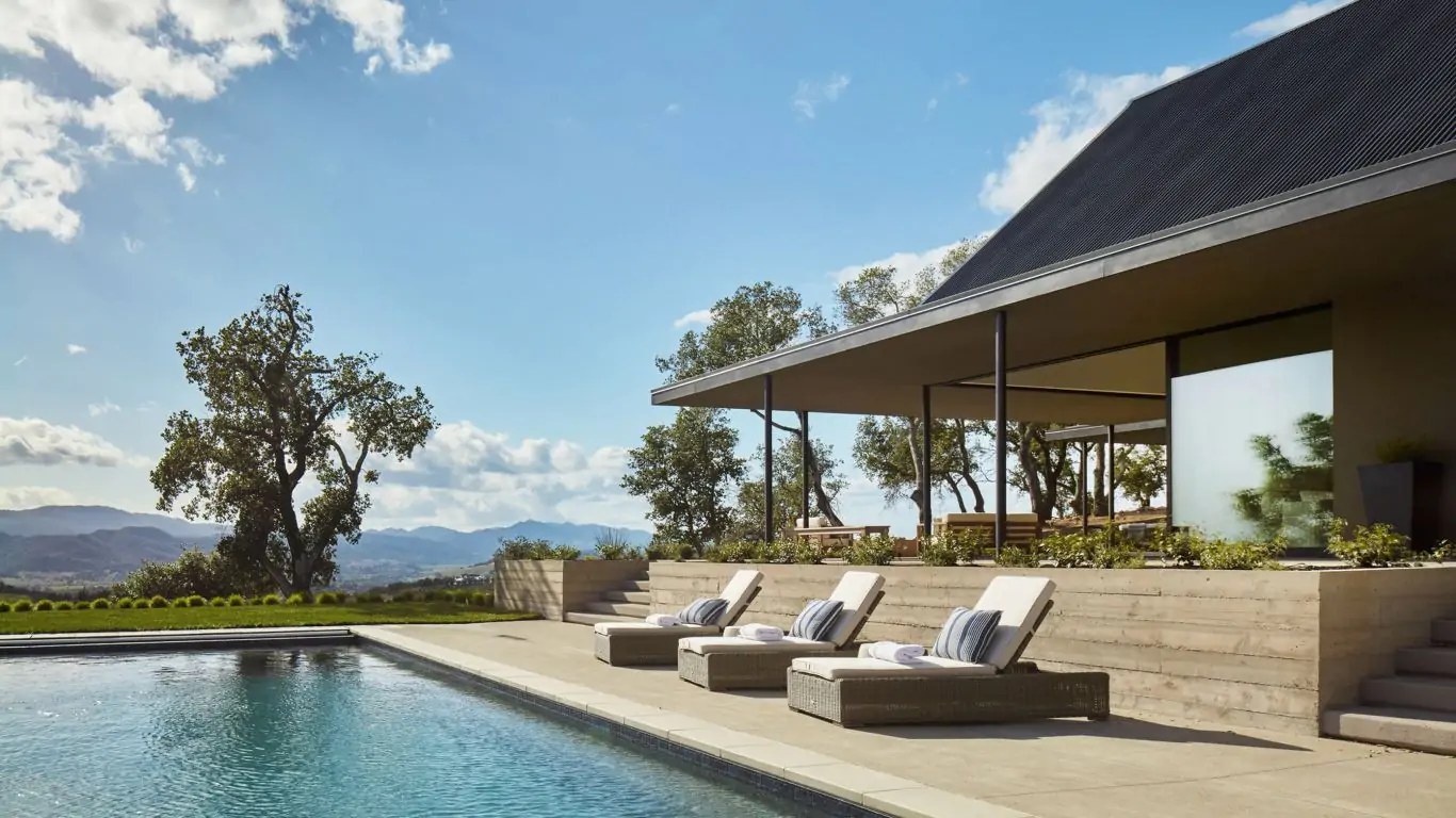 Soak up the rolling Napa Sonoma landscape views from Villa Victoria’s elegant pool or sleek loungers.