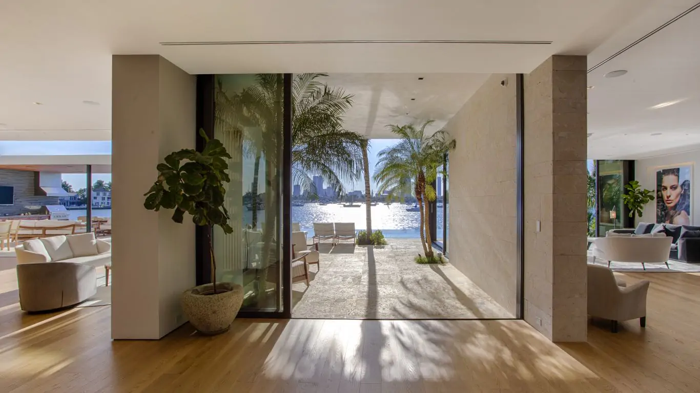 Interior view from Villa Diana in Miami, highlighting luxurious open spaces, contemporary decor, and sweeping waterfront vistas.