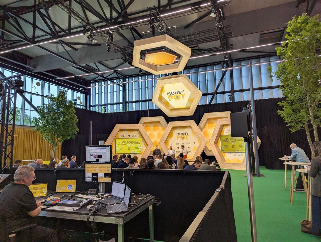 Money20/20 Europe 2026 main hall signpost pointing to The Intersection, Visa and Yapily open banking