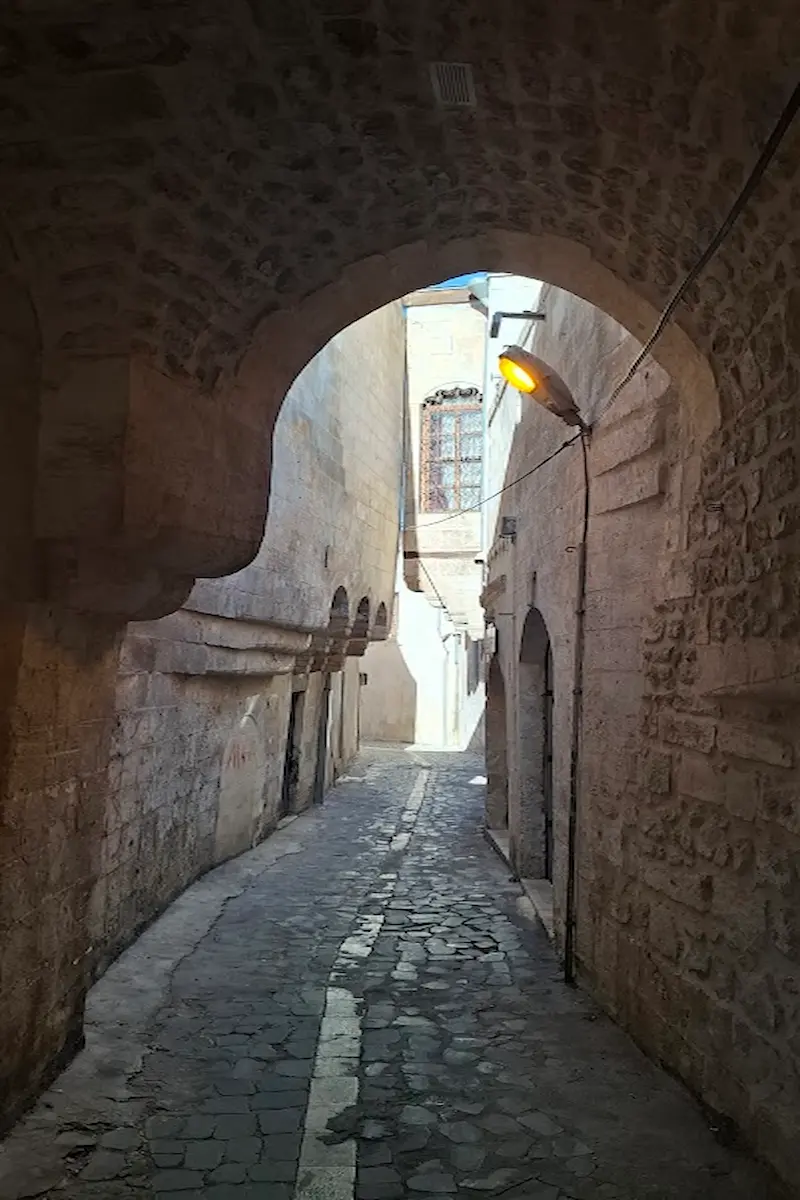 Quaint narrow street, old town Şanlıurfa, Turkey Quaint narrow street, old town Şanlıurfa, Turkey
