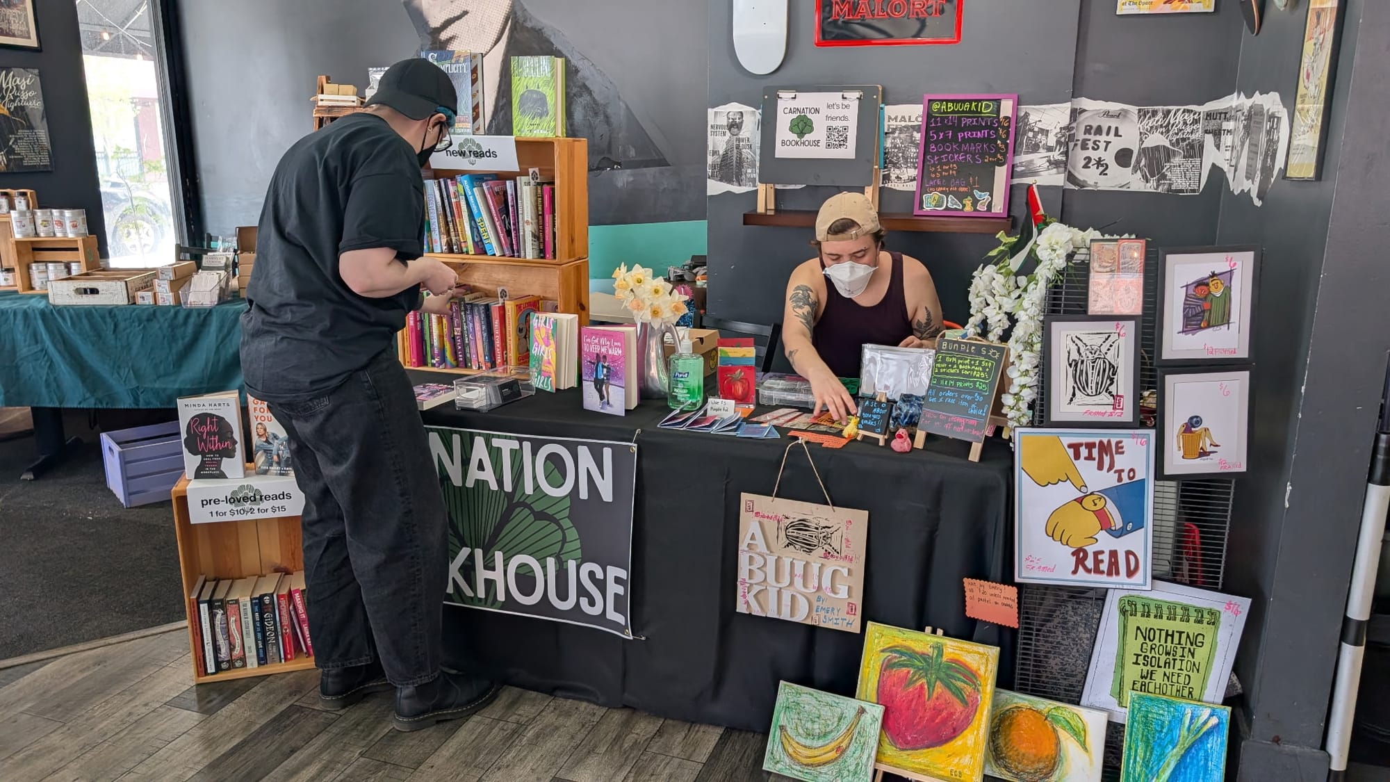 Picture of Sam and Emery, local business owners, at the Space Bazaar, a vendor fair.