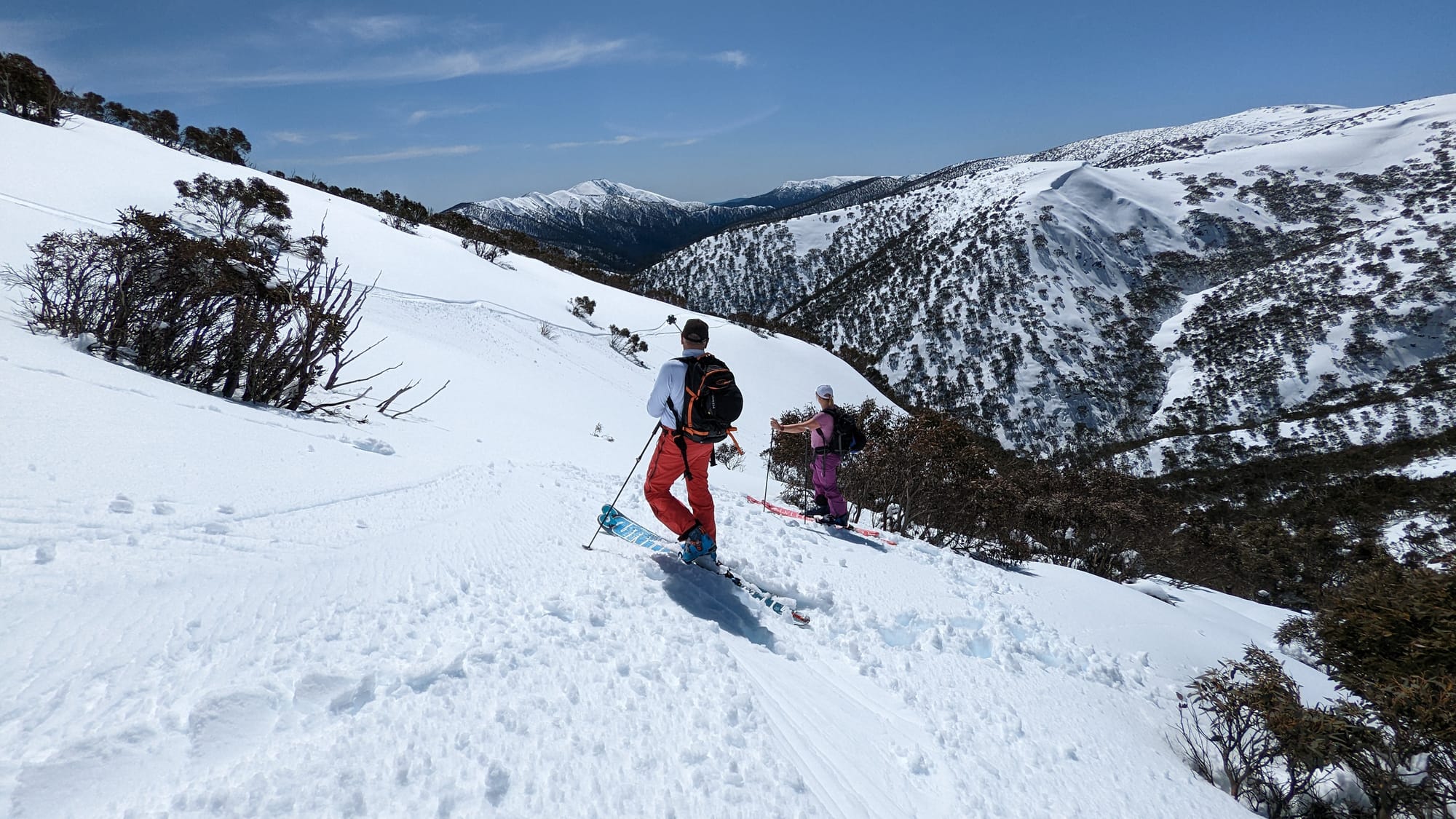 WHAT A VIEW: Greg Doyle and Lyndell Keating admiring the view toward Mt Feathertop on the climb out of Pink Hamburg. PHOTO: Chris Epskamp (Powderhounds.com)