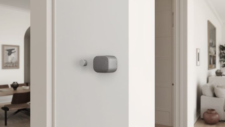 An AI voice microphone and speaker situated in a wall in a modern designed house.
