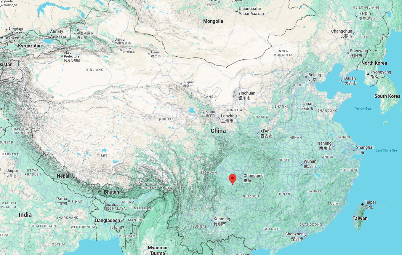 A Google Maps screenshot showing China and surrounding countries, with the topography shown. A red pin marks where Luzhou is in the Sichuan province in China.