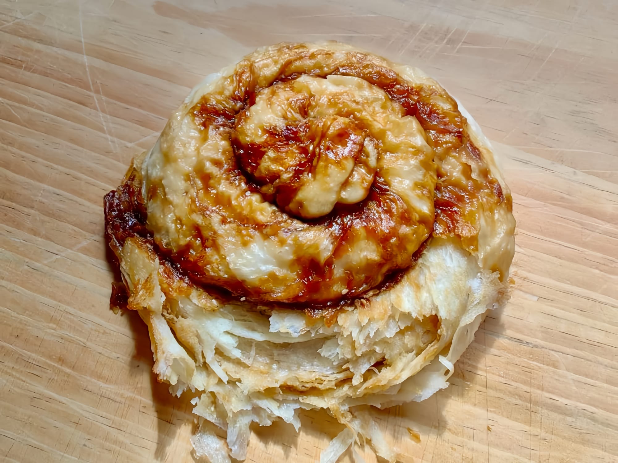 Baoshan Brown Sugar Cake - it resembles a wet flaky version of a cinnamon roll.
