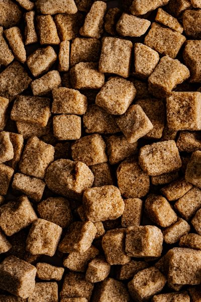 Malted brown sugar cubes close up.