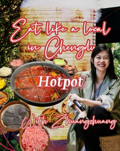 ZhuangZhuang sits holding a microphone next to Chongqing hotpot and assorted ingredient dishes.