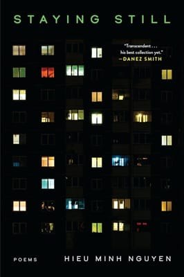 Cover of Staying Still by Hieu Minh Nguyen featuring a photograph of the side of a tall building with some windows illuminated by light and others dark
