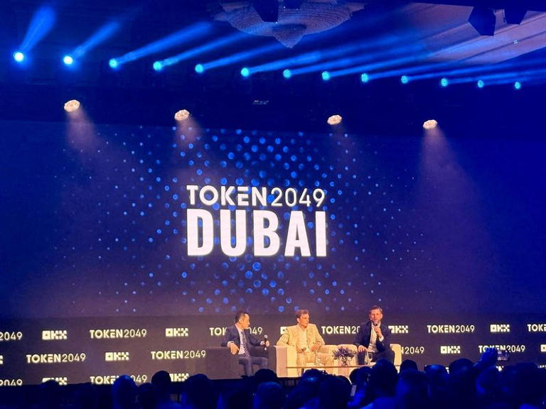 FILE PHOTO: Hong Kong-based crypto entrepreneur Justin Sun, World Liberty Financial co-founder Zach Witkoff and Executive Vice President of the Trump Organization Eric Trump attend the TOKEN2049 conference in Dubai, United Arab Emirates, May 1, 2025. REUTERS/Federico Maccioni/File Photo