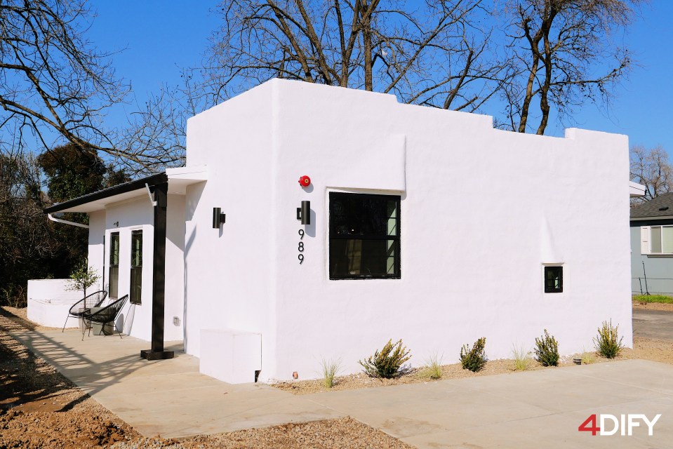 Machine builds first 3D-printed NEIGHBOURHOOD of affordable homes ¿ with first house on sale at ¿280,000