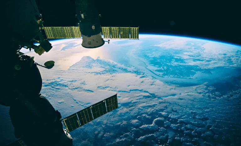 Satellites Orbiting The Earth. Credit: Shutterstock | The Daily Galaxy --Great Discoveries Channel